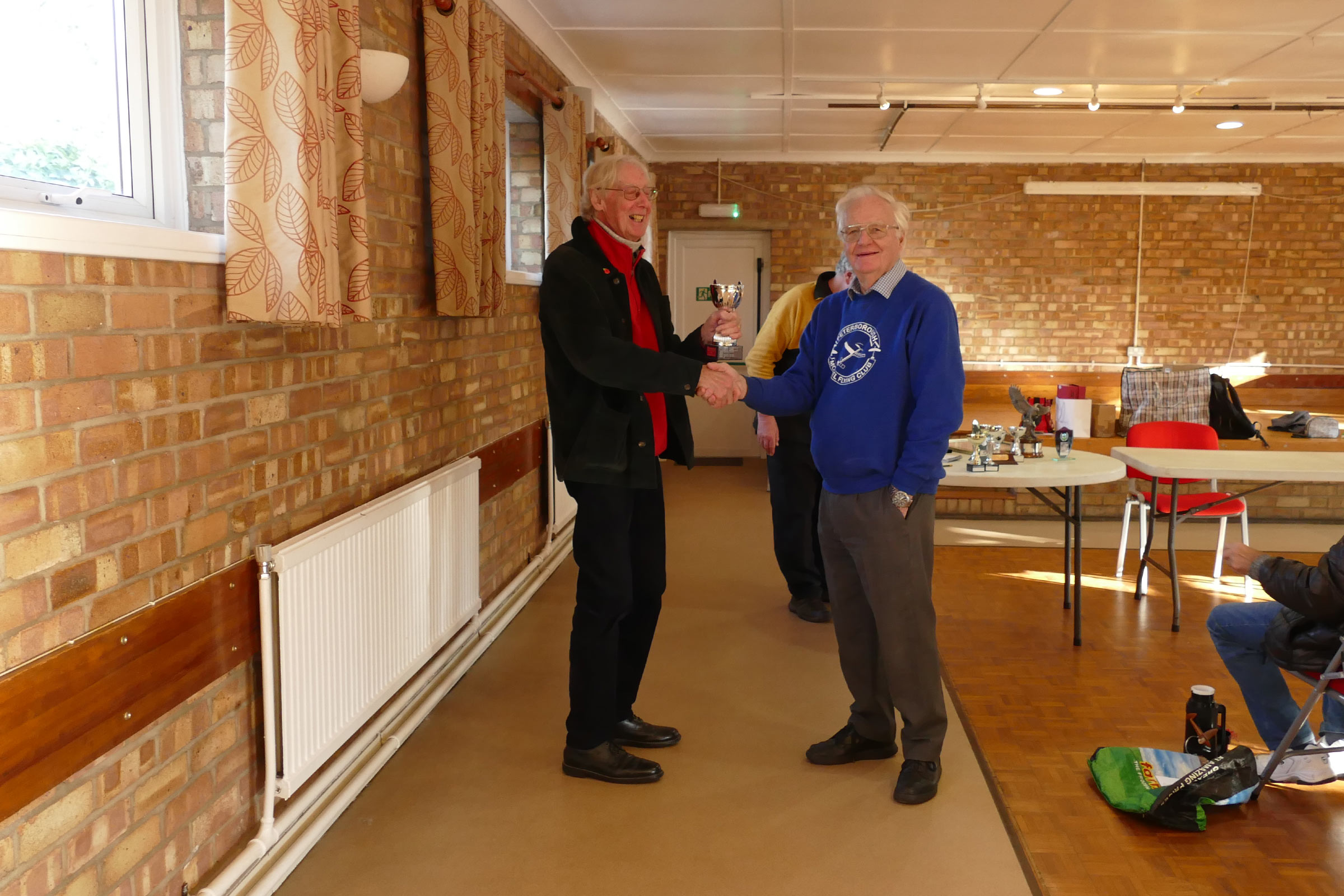 Brian Lever receives the Control Line trophy from Brian Waterland surely PMFC best double act 2025 AGM.