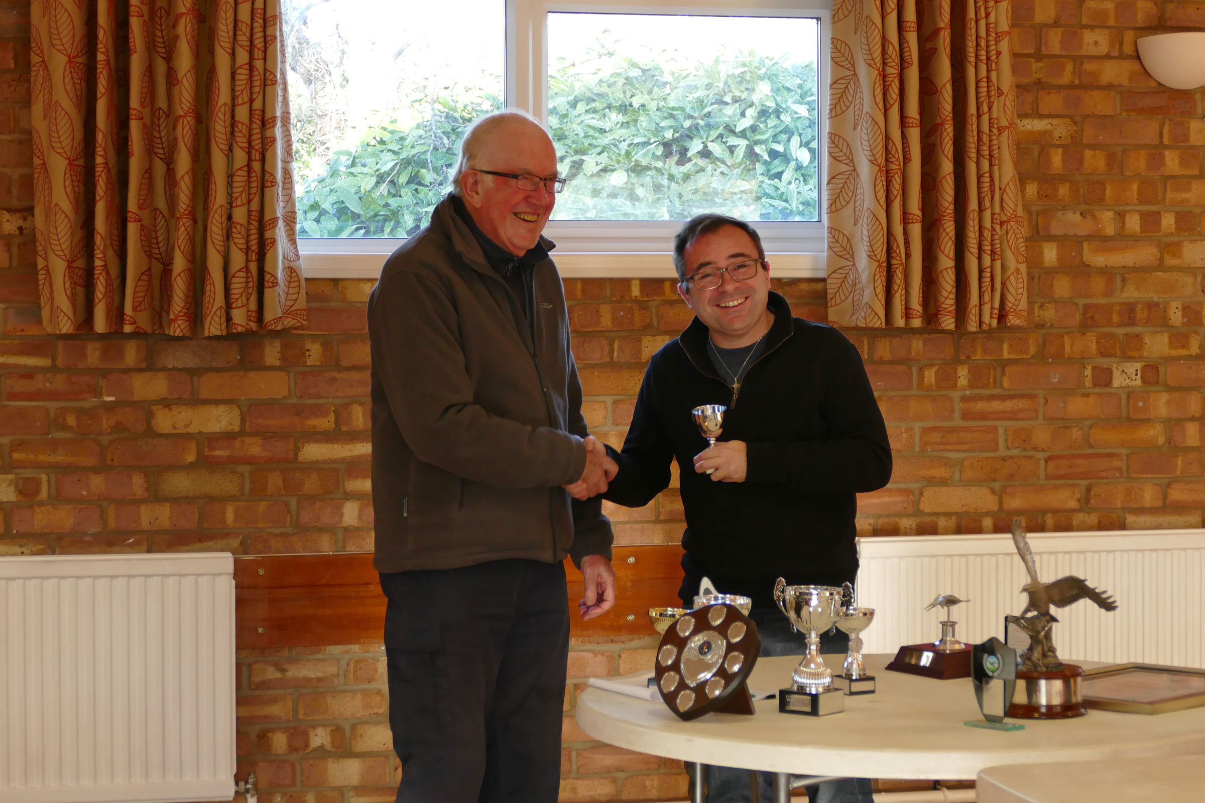 Luke Goymour collects the E20 trophy at the PMFC 2025 AGM.