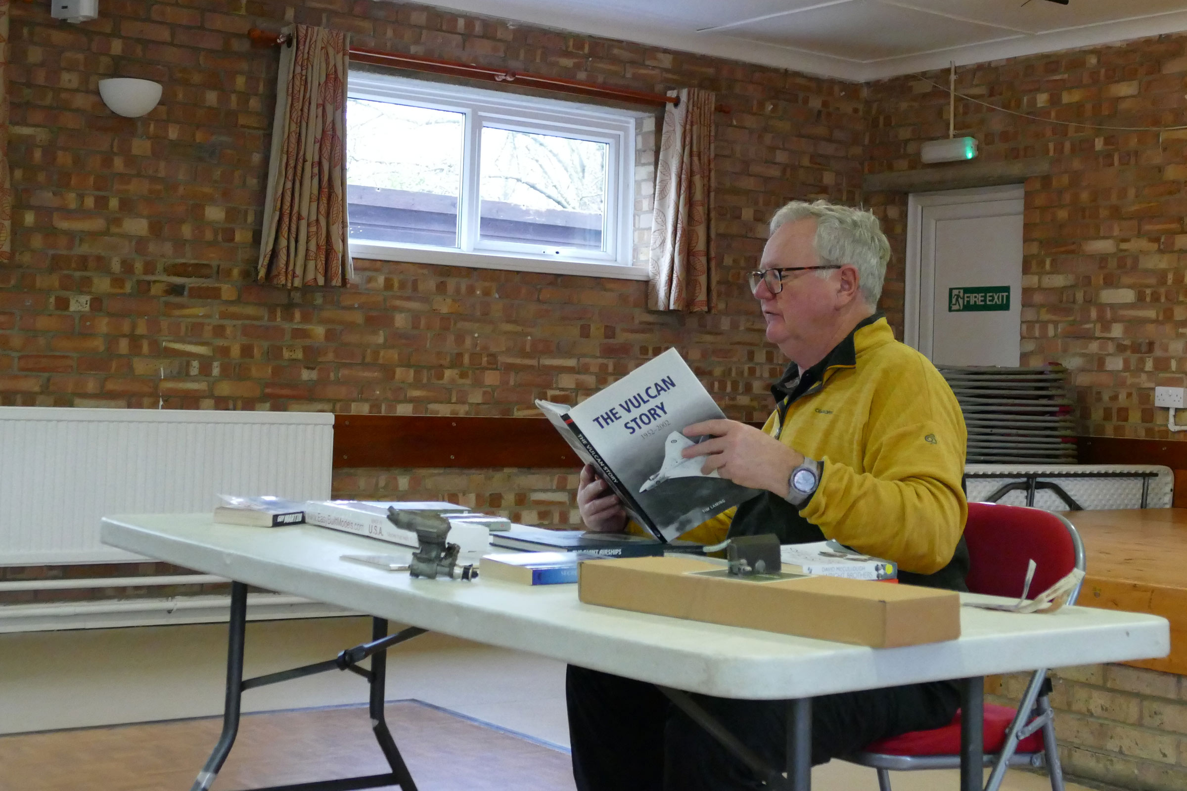 When a book is this good even the auctioneer could not put it down. PMFC Christmas party/auction 2025.
