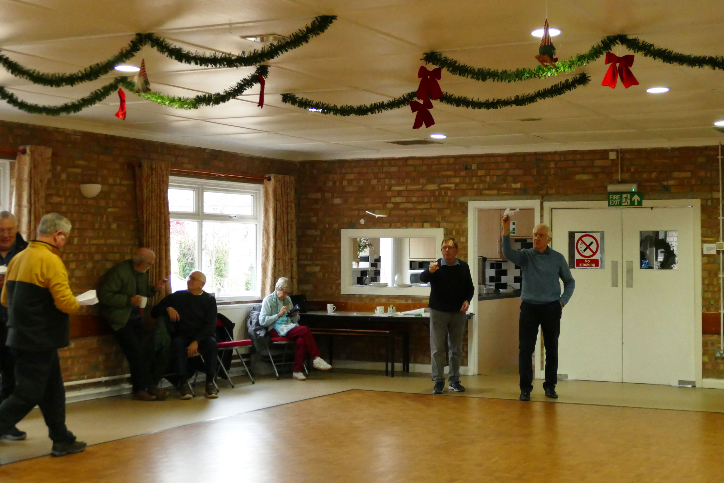 More paper darts at the ready PMFC Christmas party/auction 2025.