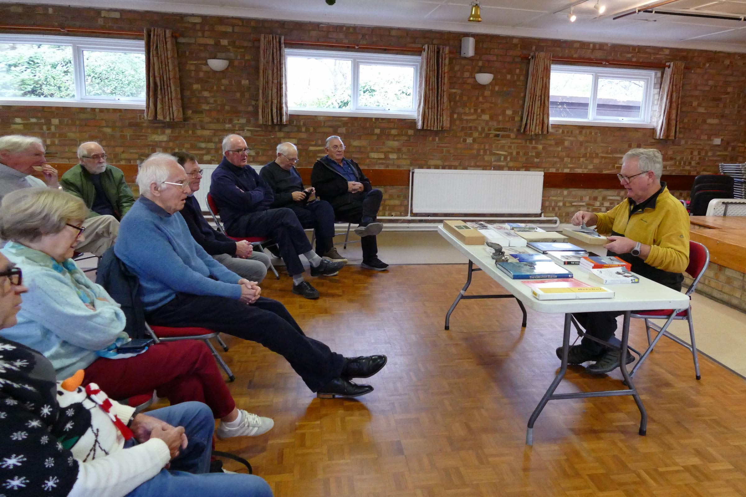 Fed up with repeats on TV over Christmas, then you should have attended the PMFC 2025 Christmas party, as there were loads of great books and goodies being auctioned off.